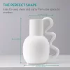 Vaza pitcher sculpturala Navaris, 15.5x11x19 cm, cu maner, dolomit, alb, plastic