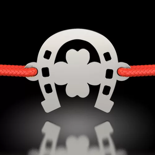 Srebrna bransoletka na sznurku w kształcie podkowy z koniczynami